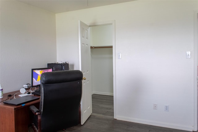 office with dark hardwood / wood-style floors