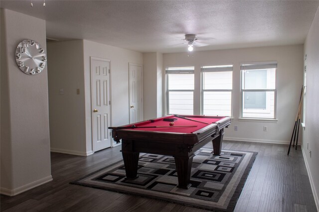 rec room featuring a textured ceiling, dark hardwood / wood-style flooring, ceiling fan, and billiards