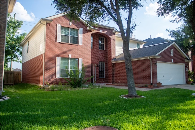 front of property with a garage and a front lawn