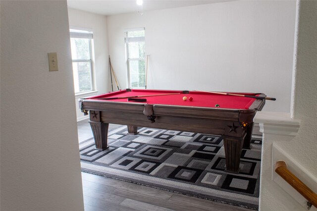 rec room with hardwood / wood-style flooring and billiards