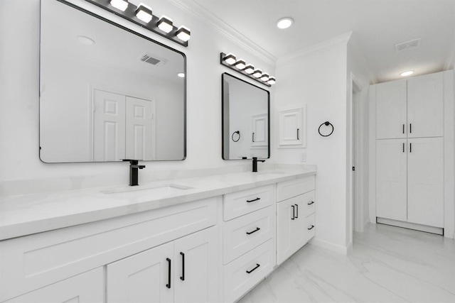 bathroom featuring vanity and crown molding