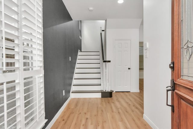 foyer with light wood-type flooring