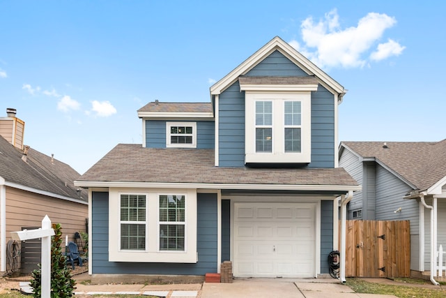 view of front of property with a garage