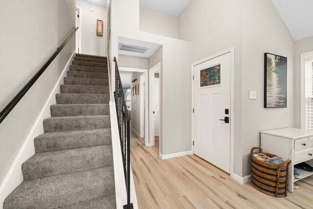 foyer with light wood-type flooring