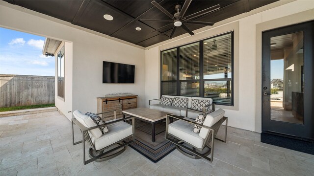 view of patio / terrace with ceiling fan and an outdoor hangout area