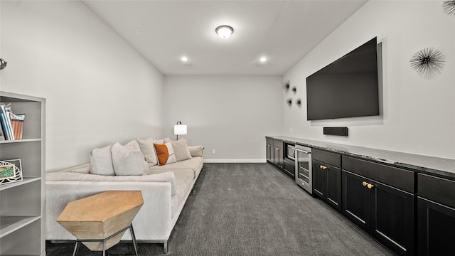 living room featuring dark carpet and wine cooler