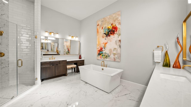 bathroom featuring vanity and independent shower and bath