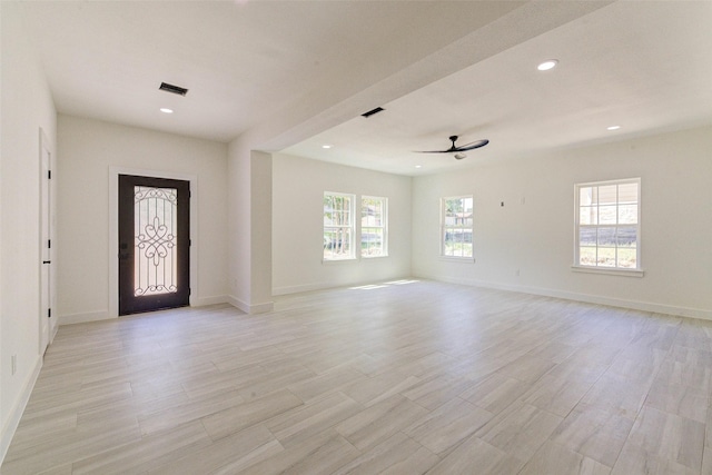 foyer with recessed lighting, visible vents, light wood-style flooring, ceiling fan, and baseboards