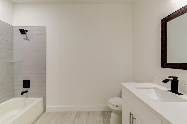 bathroom with shower / bath combination, baseboards, toilet, wood finished floors, and vanity