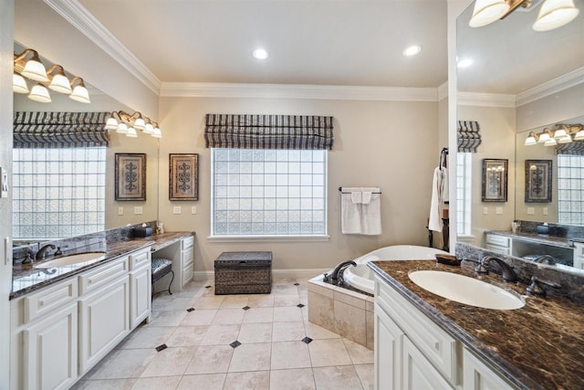 bathroom featuring a washtub, tile patterned flooring, crown molding, and vanity