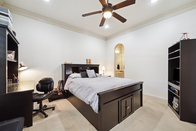 bedroom with ornamental molding, light colored carpet, and ceiling fan