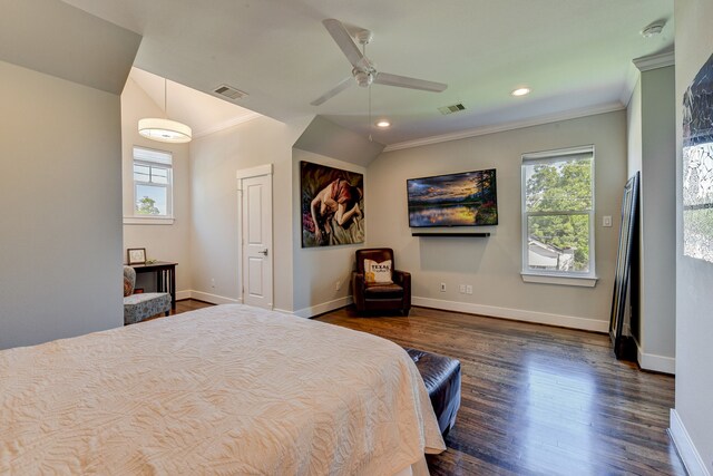 bedroom with ornamental molding, dark wood-style flooring, visible vents, and baseboards