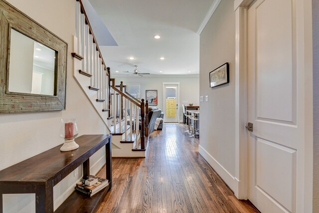 foyer with baseboards, dark wood finished floors, ceiling fan, stairway, and recessed lighting