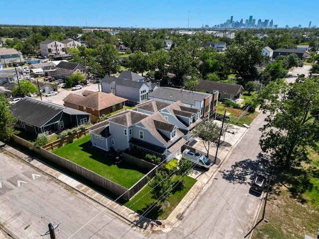 drone / aerial view featuring a view of city and a residential view