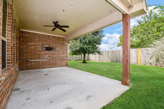 view of patio with ceiling fan