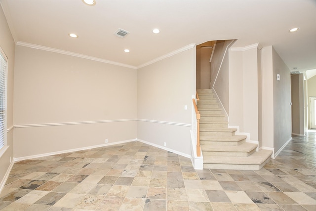 stairs featuring crown molding