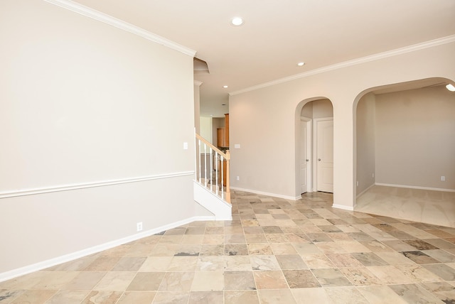 spare room with crown molding