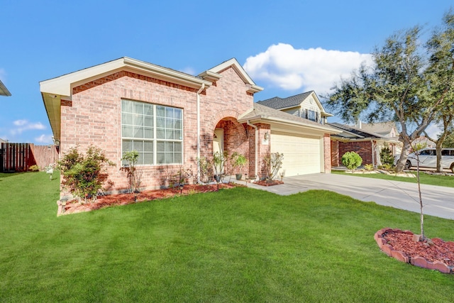 view of front of property featuring a front yard and a garage