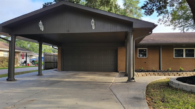 view of front of house with a garage and a carport