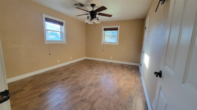 unfurnished room featuring ceiling fan and light hardwood / wood-style flooring