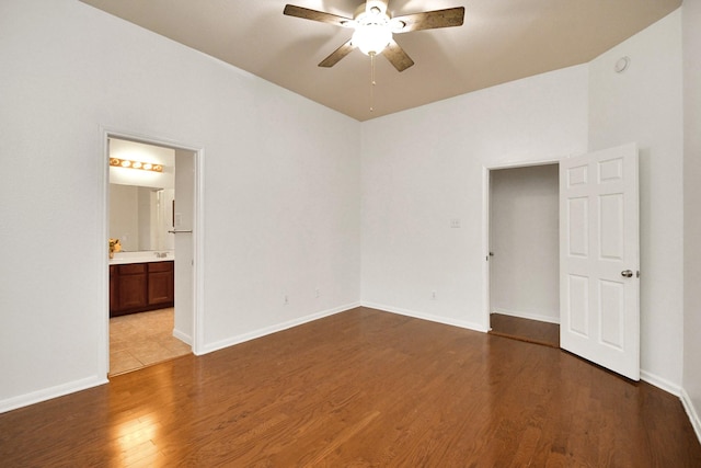 unfurnished room with wood-type flooring and ceiling fan