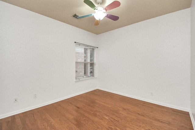 unfurnished room featuring hardwood / wood-style floors