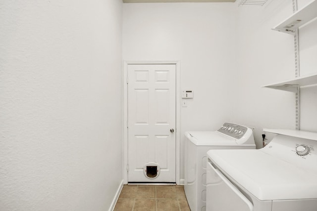 laundry room with washer and clothes dryer