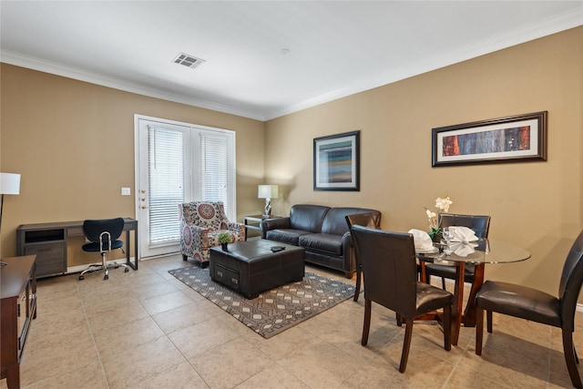 living room with light tile patterned flooring and ornamental molding