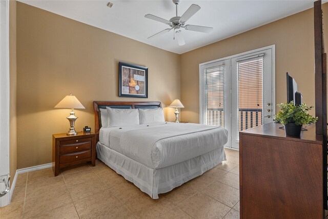 bedroom featuring ceiling fan, access to exterior, and light tile patterned floors