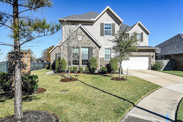 front facade featuring a garage and a front yard