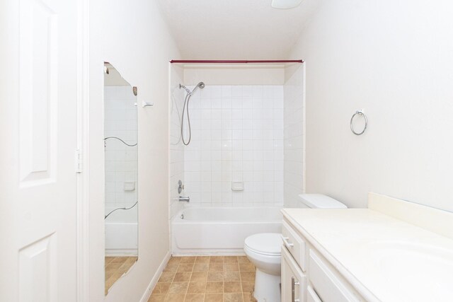 full bathroom featuring vanity, toilet, and tiled shower / bath