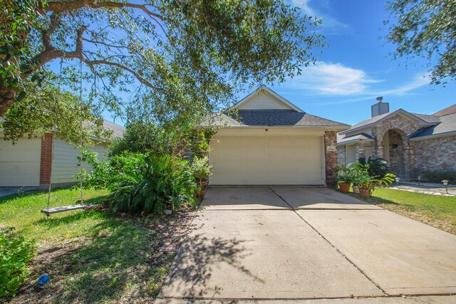 ranch-style home with a garage