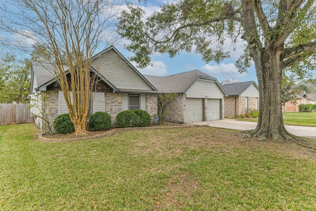 view of front facade with a front lawn and a garage