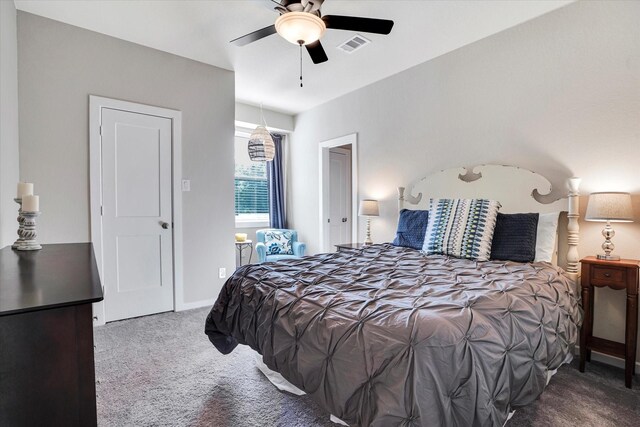 carpeted bedroom with ceiling fan