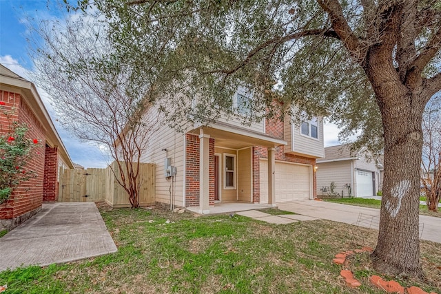 view of front of house with a garage and a front yard