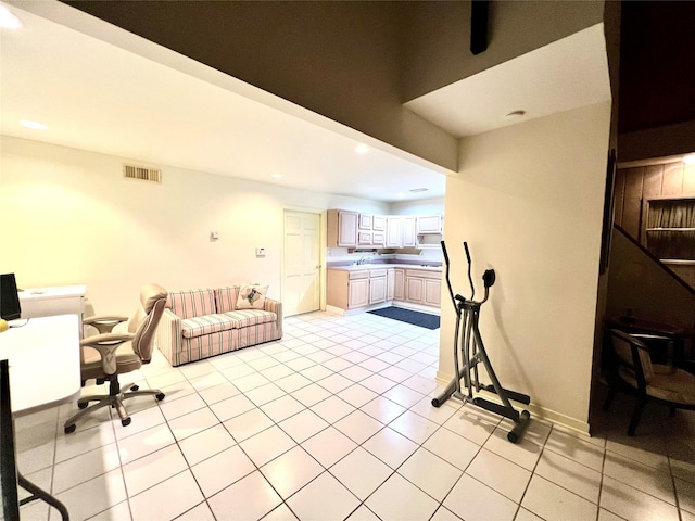 living room with light tile patterned floors