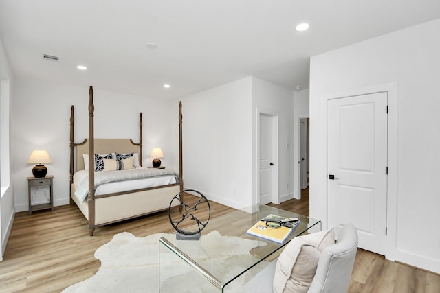 bedroom with light wood-type flooring