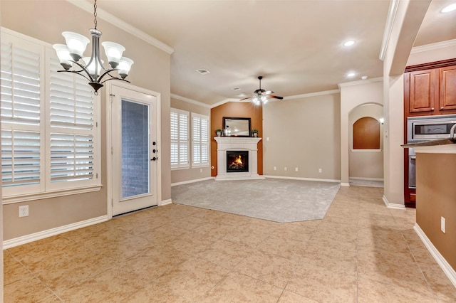 unfurnished living room with ceiling fan with notable chandelier, crown molding, and lofted ceiling