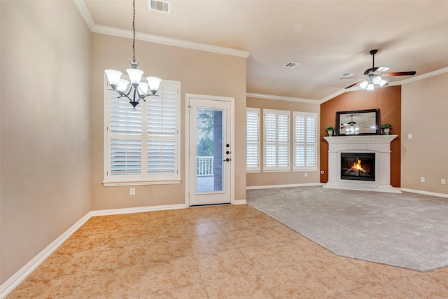 unfurnished living room with lofted ceiling, crown molding, ceiling fan with notable chandelier, and carpet