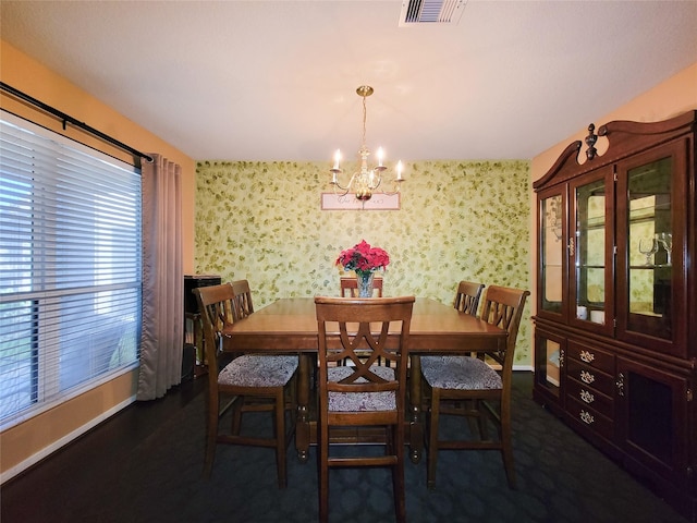 dining room featuring a notable chandelier