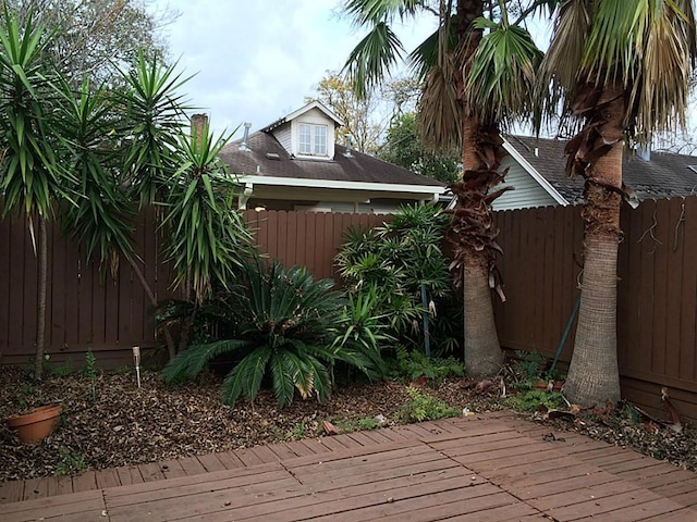 wooden deck featuring fence