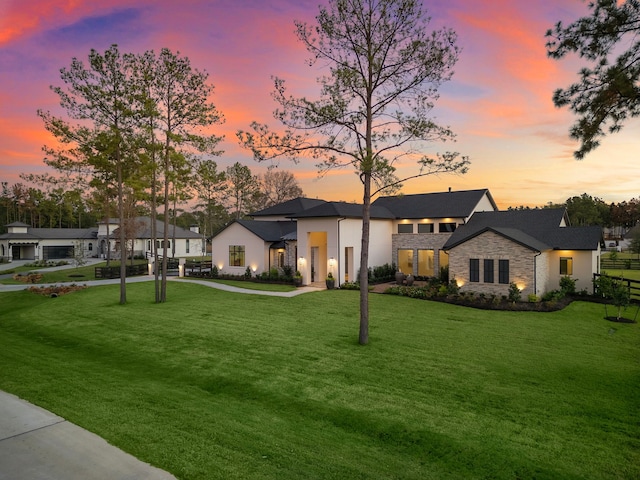 view of front of house with a lawn