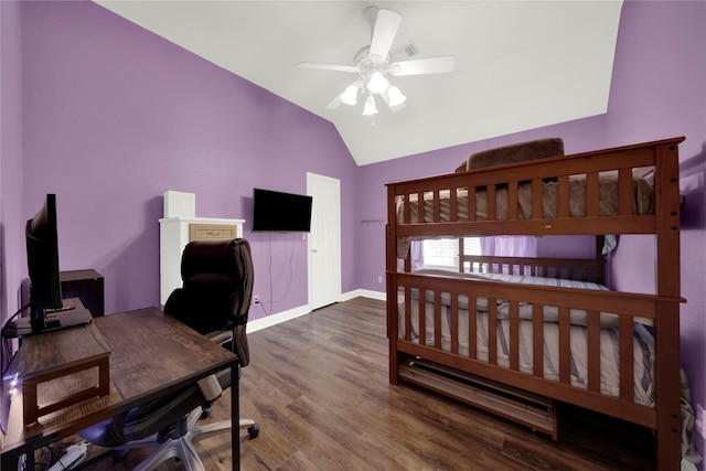 bedroom featuring hardwood / wood-style floors, ceiling fan, and vaulted ceiling