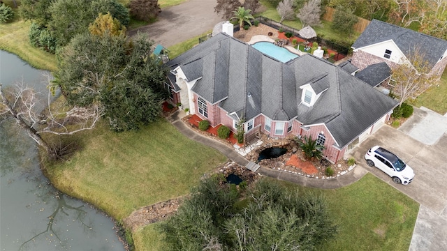 drone / aerial view with a water view