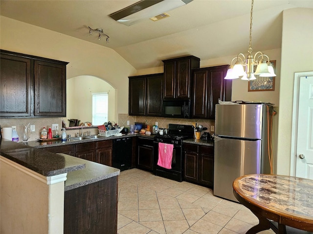 kitchen with black appliances, kitchen peninsula, and backsplash