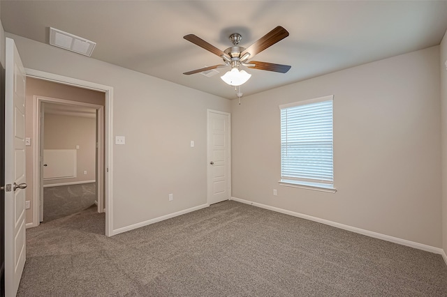 unfurnished bedroom featuring carpet, a closet, and ceiling fan