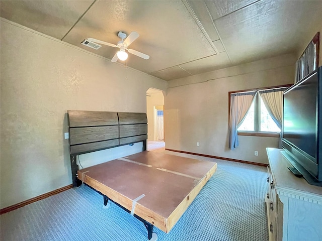 unfurnished bedroom featuring carpet flooring and ceiling fan