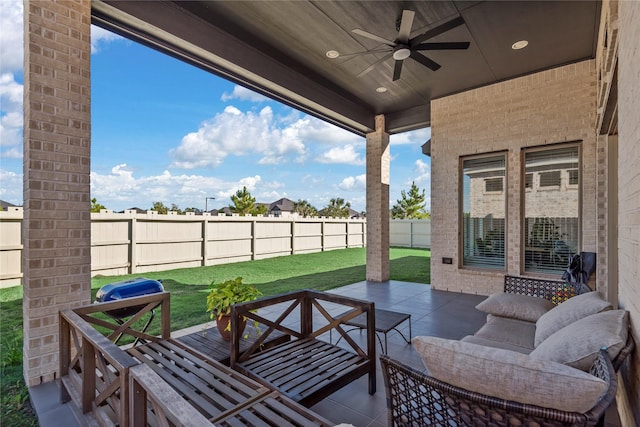 view of patio with an outdoor hangout area and ceiling fan