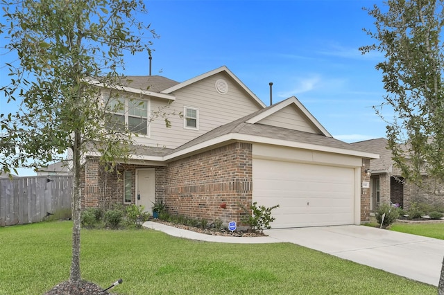 view of front facade with a front yard and a garage