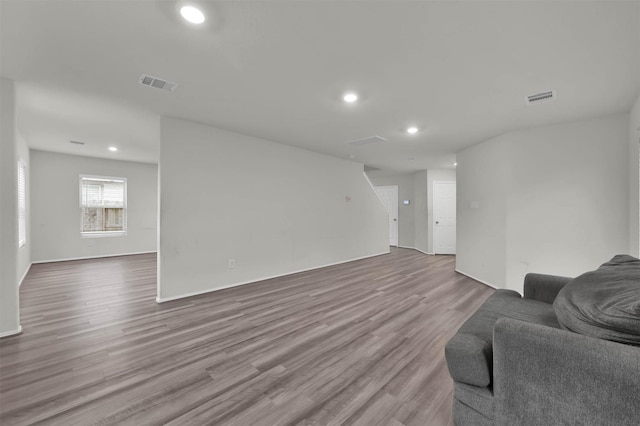 living room with light hardwood / wood-style floors